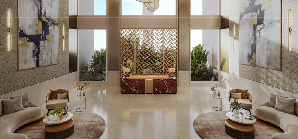 Grand double-height lobby entrance at Godrej Elaris